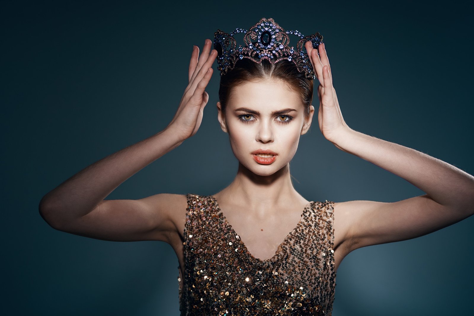 Cheerful Woman with a Crown on Her Head Jewelry Luxury Celebrity