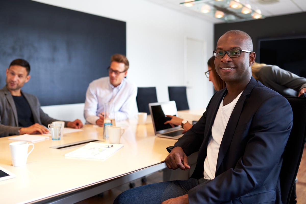 Black Male Executive Facing Camera 